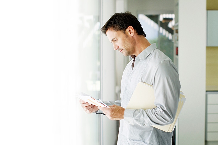 Man reading mail
