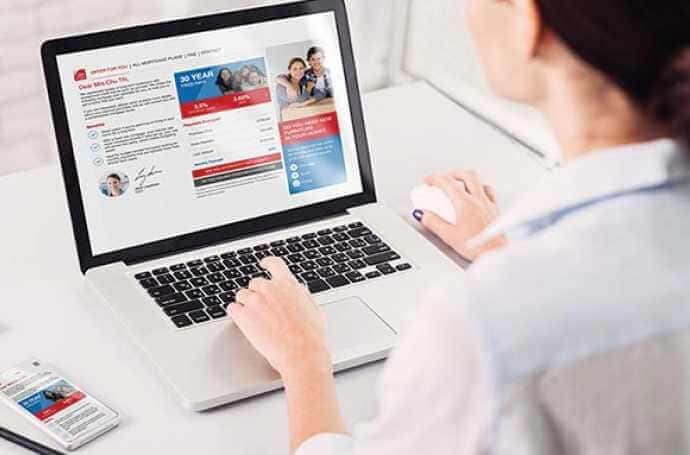 a woman on a laptop looking at training materials