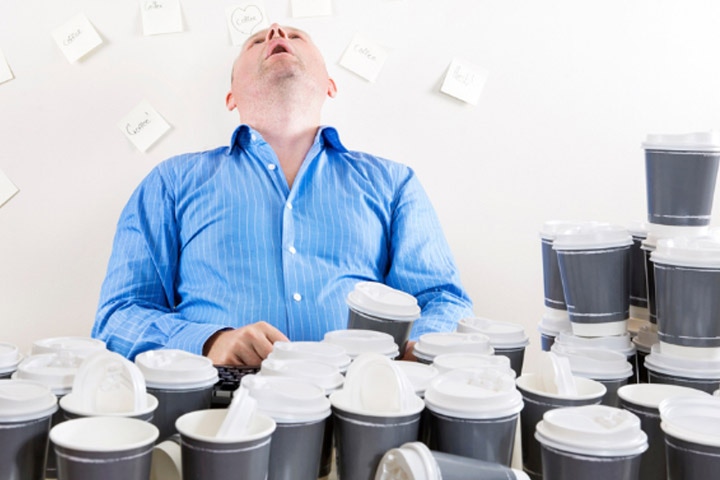 man with many coffee cups man with many coffee cups