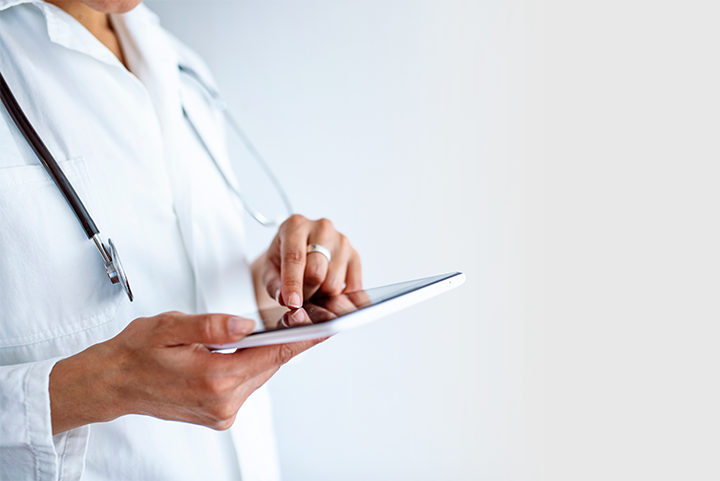 doctor with tablet